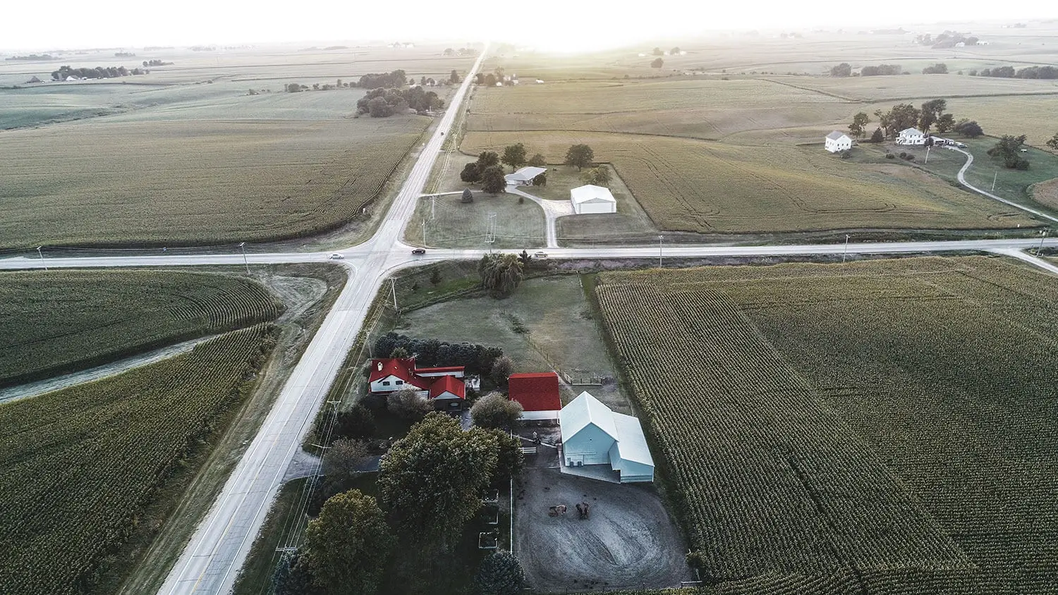 low saturation aerial photo of vacant farm land